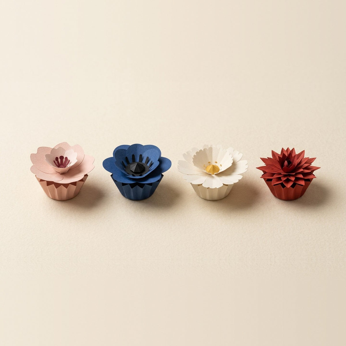 Forever Paper Flowers by FOLDORI: Sakura, Anemone, Daisy and Dahlia, each on its tonal pleated paper cup