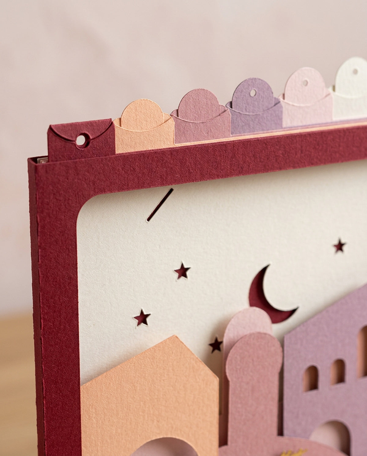 Close-up of the Love Letters Pocket Story: layered paper and cut edges