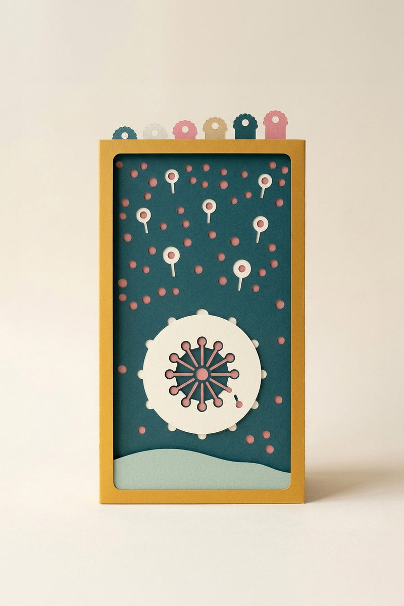 Mother's Love Pocket Story seen from the front: a white moon disc and seed balloons on a teal paper sky, in a saffron sleeve (AI-generated image)